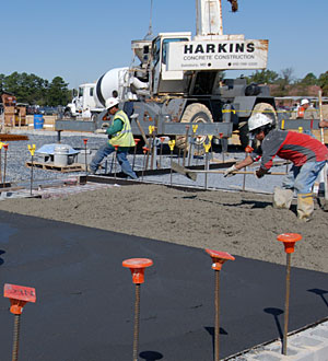 Contractors working with concrete